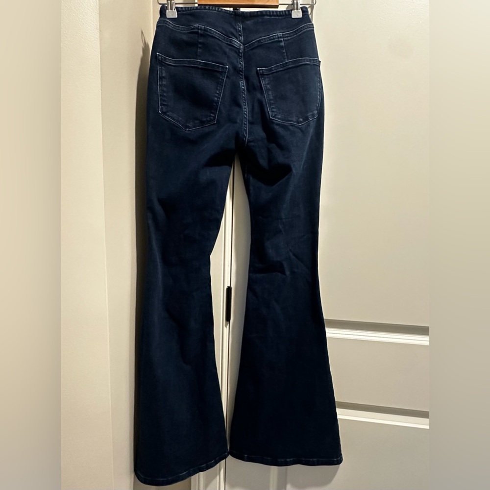 JCPenney Dark Blue Buttoned Flare Jeans - Picture 2 of 9